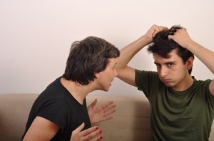 Adult sister and brother arguing at home by artur84/Freedigitalphotos.net