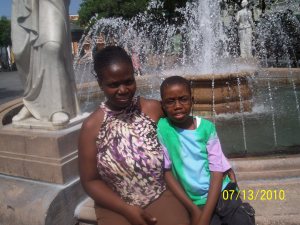 My son and I at the fountain in Old San Juan
